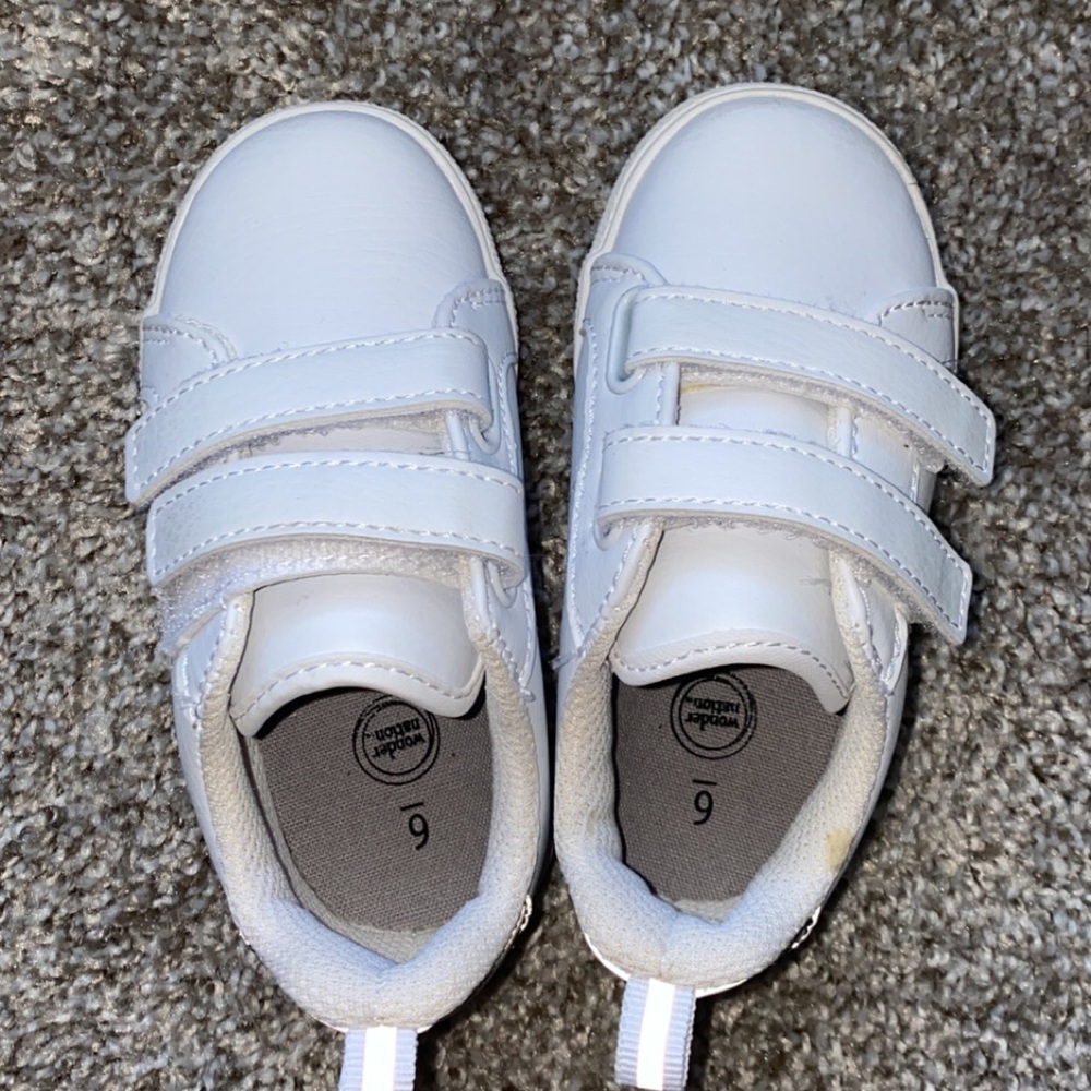 White toddler Velcro strap sneaker.